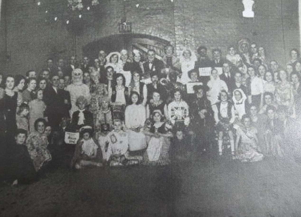 Historic gathering inside the Woolton Baths pool hall with the temporary winter floor in place